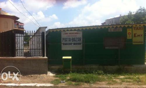 teren central, linga Catedrala Adjud, str Al. I Cuza, cu piata bazar la cheie. +teren+toate utilitatile cu toate actele si taxele la zi.